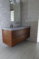 Thumb vanity  contemporary style  walnut  medium color  banded door  frameless construction  floating