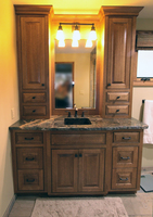 Thumb vanity  craftsman style  quartersawn oak  dark color  raised panel  flush mount  two towers  bank of drawers