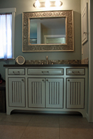 Thumb vanity  traditional style  painted with glaze  wainscot panel  flush mount  medicine cabinet  arched toekick