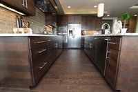 Thumb kitchen  contemporary style  quartersawn walnut  banded door  dark color  custom wood hood  full overlay
