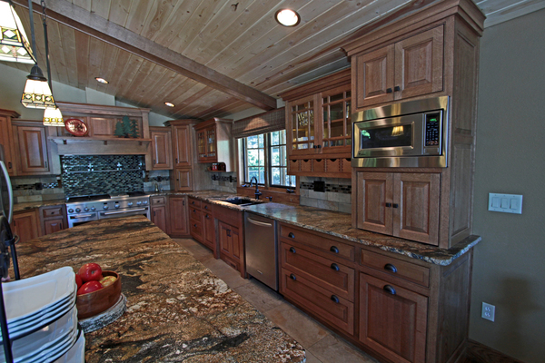 Bigthumb kitchen  craftsman style  quartersawn oak  medium color  flush mount  glass  wood hood  appliance garage  diagonal corner cabinets  micro in upper cabinet  cup rack  front dovetail drawers