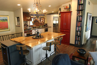 Thumb kitchen  traditional style  painted  recessed and raised panel  sand through  red  bookcase  accent color island   tall cabinet  standard overlay