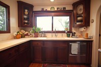 Thumb kitchen  traditional style  walnut  dark color  recessed panel  flush mount  diagonal corner uppers with glass doors