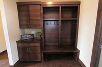 Thumb misc  contemporary style  quartersawn walnut  dark color  banded door  cubbies  lockers  coat hooks  drop off station  bench  square crown  full overlay